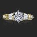 Tiffany Style Channel Set Baguette and Pave Mounted Round Beveled Diamond Engagement Ring Laying Down