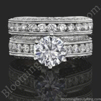 The engagement ring and matching wedding band stacked front on, milgrain edges and channel set diamonds - nrd411eb-1