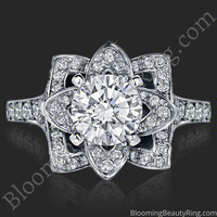 The Small Crimson Rose engagement ring of this set, laying down