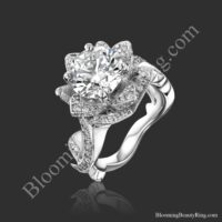 Angled view of the nature inspired lotus leafy flower engagement ring set showing its leafy vine band - bbr626set