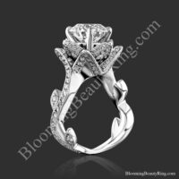 The floral inspired lotus leafy diamond flower engagement ring set standing up, petals cradling a round center - bbr626set