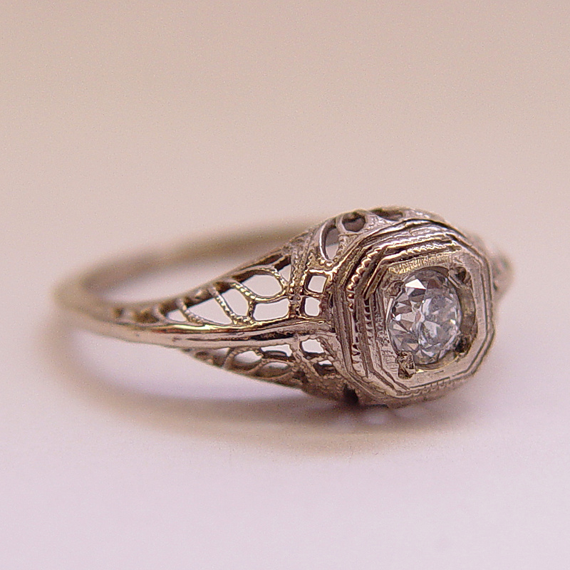 Victorian-inspired hexagonal filigree diamond engagement ring in white gold