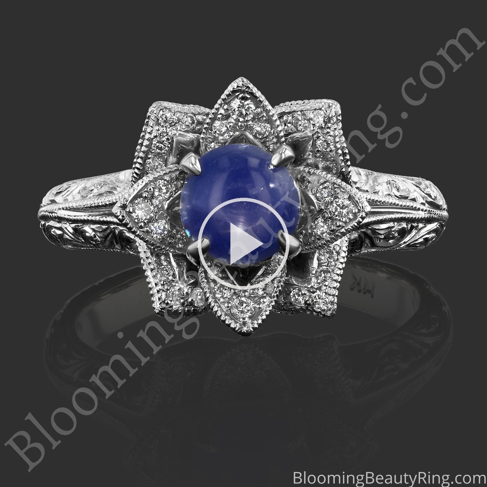 Hand Engraved 8 Petal .58 ct. Diamond Lotus Flower Ring – bbr588-2 with a star sapphire center laying down video