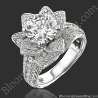 Angled view of the large hand engraved blooming beauty flower engagement ring showing the engraved petals and shank - bbr434en