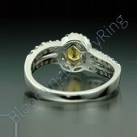 1.26 ctw. Oval Yellow Sapphire and Diamond Wave Ring - view 3