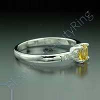 .64 ctw. Oval Yellow Sapphire and Princess Diamond Ring - view 2