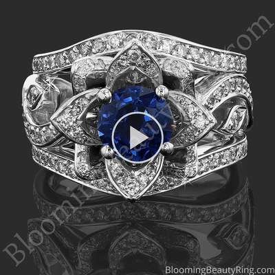 The Large Lotus Swan Double Band Flower Ring Set – bbr626-1 with a blue sapphire center laying down video
