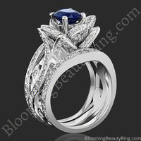 The Large Lotus Swan Double Band Flower Ring Set – bbr626-1 with a blue sapphire center standing up