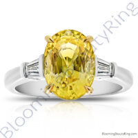 5.28 ctw. 3 Stone Oval Yellow Sapphire and Diamond Baguette Ring 