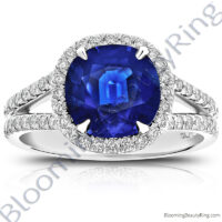 3.75 ctw. Blue Cushion Sapphire Halo Ring with 60 Round Diamonds