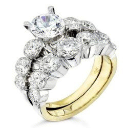 Two tone engagement ring set with large graduated round diamonds on a white gold band over a yellow gold wedding band - BBR-0082