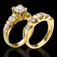 Tension Set Large Diamond Curved 8 Prong Engagement Ring and Matching Wedding Band