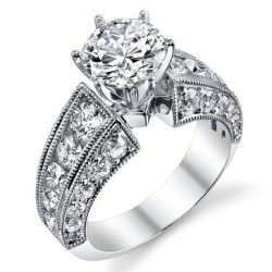 Round diamond engagement ring set above a wide flared band of graduated pave diamonds with milgrain edging - bbr3252-3
