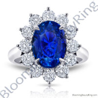 7.70 ctw. Diamond and Oval Blue Sapphire Princess Di Ring