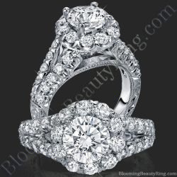 Round diamond ringed by a halo of larger round diamonds above a split shank set with pave and hand engraving - bbr567