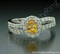 1.26 ctw. Oval Yellow Sapphire and Diamond Wave Ring