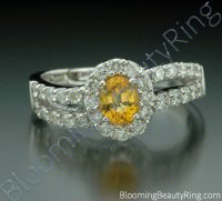 1.26 ctw. Oval Yellow Sapphire and Diamond Wave Ring