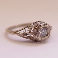 002FBBR Victorian-inspired hexagonal filigree engagement ring with a round diamond