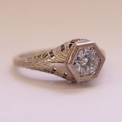 039FBBR antique filigree engagement ring with a round diamond and swirling details
