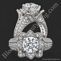 The small hand engraved blooming beauty flower ring standing tall with petals wrapped around a round center - bbr434en-s