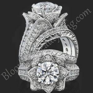 Two views of the small hand engraved blooming beauty flower ring with its matching engraved wedding band, standing and face on - bbr434en-s-set